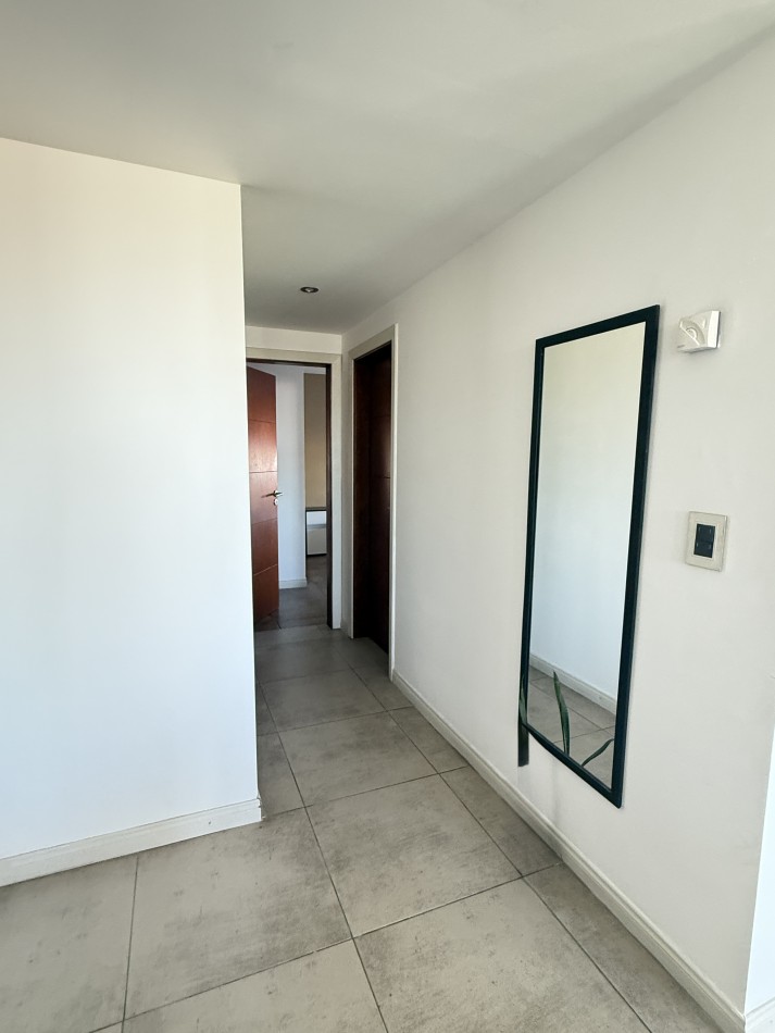 Departamento tres ambientes con cochera 