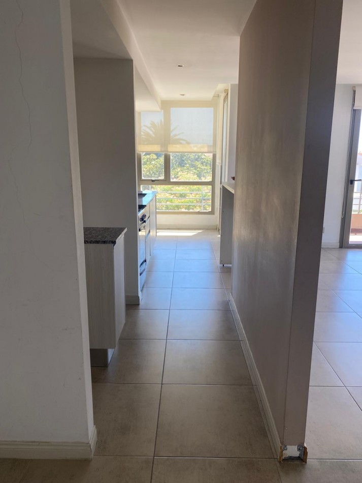 Departamento tres ambientes con cochera 