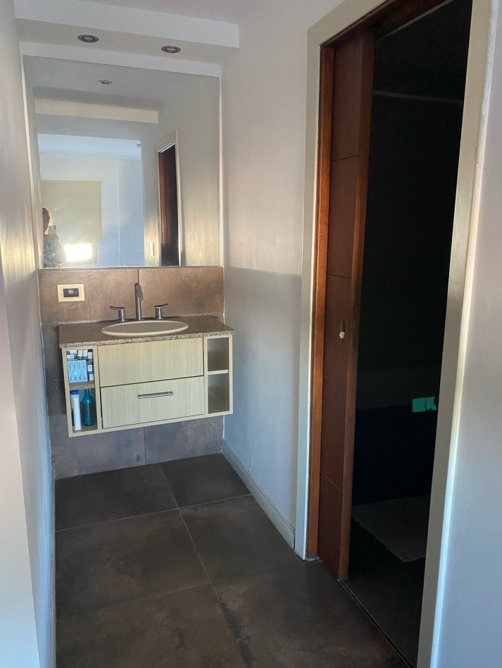 Departamento tres ambientes con cochera 