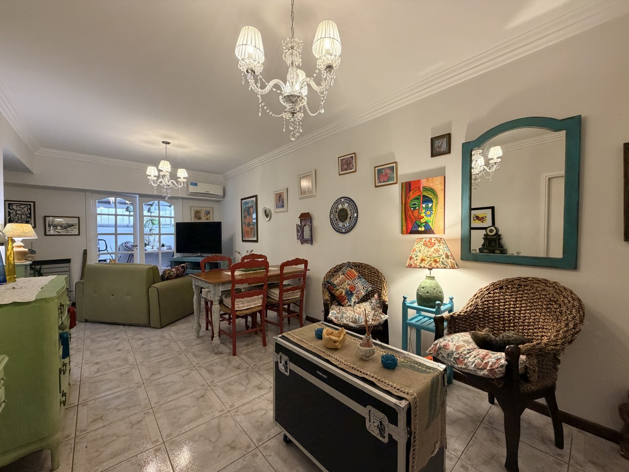 Venta departamento 4 ambientes con patio y cochera  