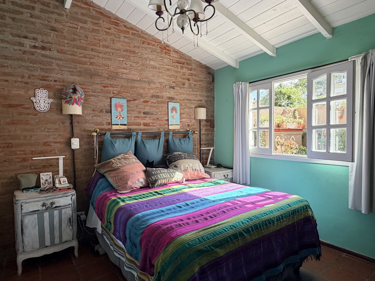 Venta departamento 4 ambientes con patio y cochera  