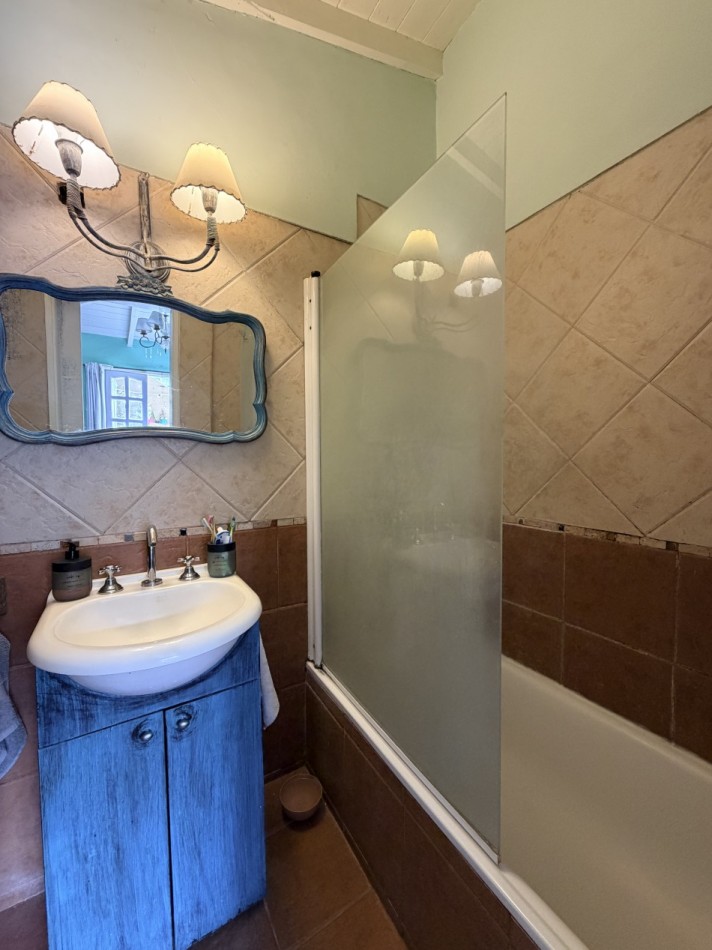 Venta departamento 4 ambientes con patio y cochera  