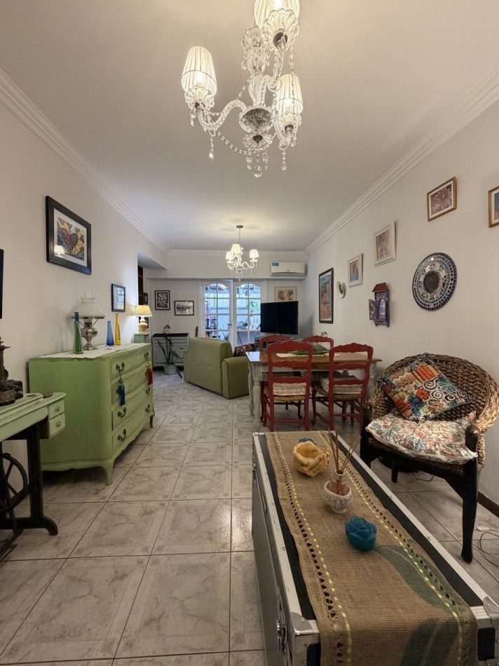 Venta departamento 4 ambientes con patio y cochera  